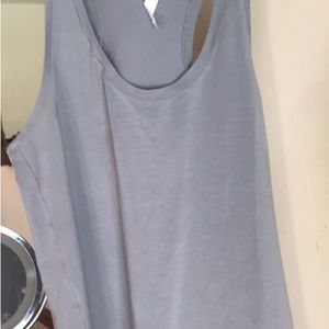 Lululemon Love Tank size 12. Excellent condition. Color is grey RHIG